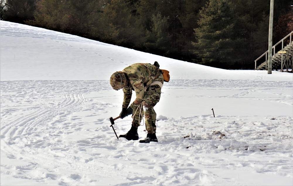 Fort McCoy CWOC class 21-03 students train using snowshoes, ahkio sleds