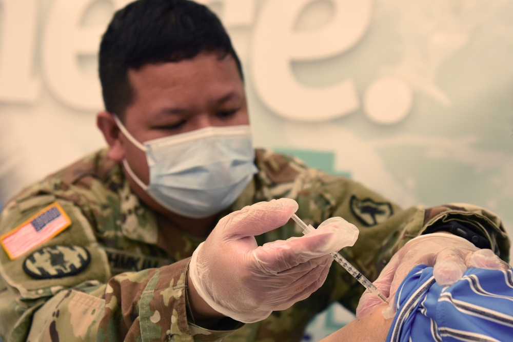 South Carolina National Guard medics team up with Tidelands Health South to administer COVID vaccinations