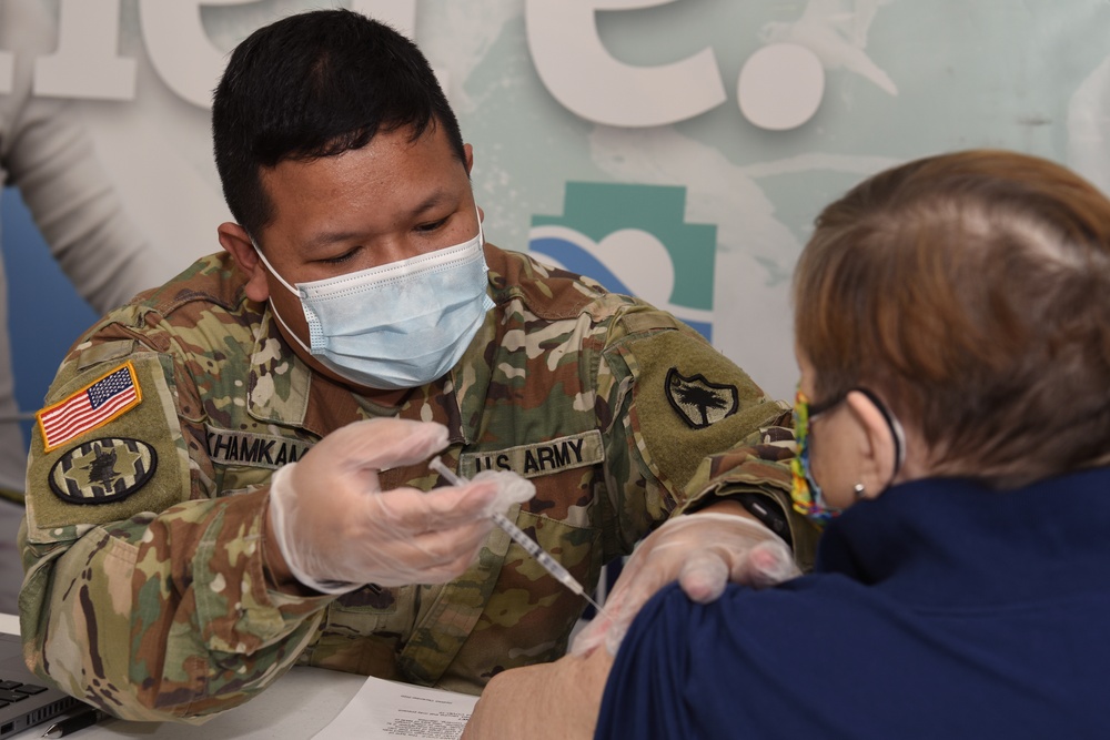 South Carolina National Guard medics team up with Tidelands Health South to administer COVID vaccinations