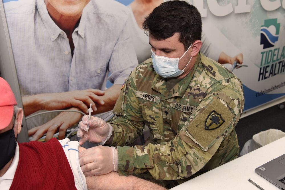 South Carolina National Guard medics team up with Tidelands Health South to administer COVID vaccinations