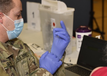 South Carolina National Guard medics team up with Tidelands Health South to administer COVID vaccinations
