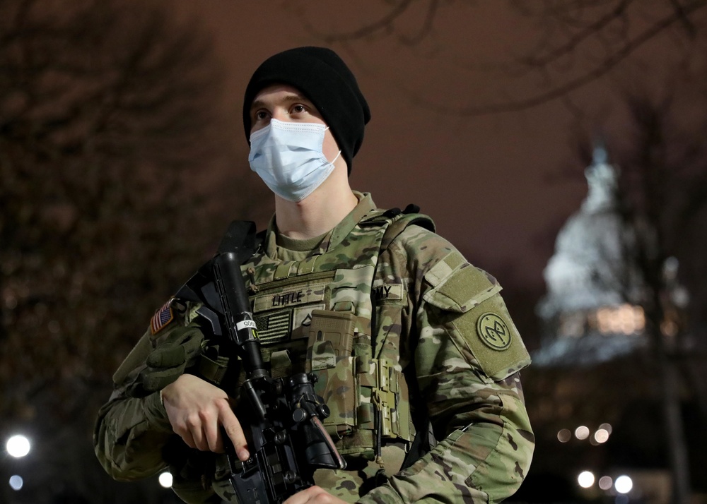 New York National Guard Soldiers stand guard over U.S. Capitol