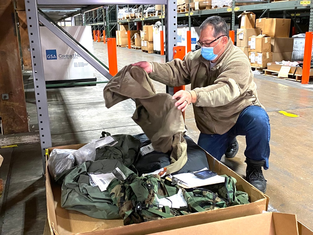 Disposal Services Representative Allan Coronacion inspects excess equipment warehoused, Defense Logistics Agency Disposition Services property disposal field site in Susquehanna, PA