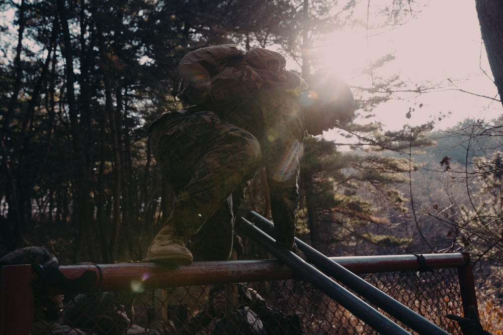 U.S. Marines, Sailors navigate obstacle course