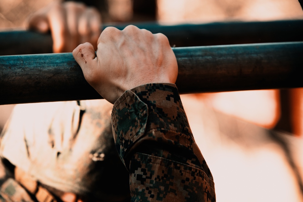 U.S. Marines, Sailors navigate obstacle course