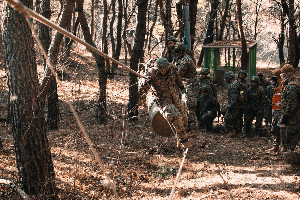 U.S. Marines, Sailors navigate obstacle course