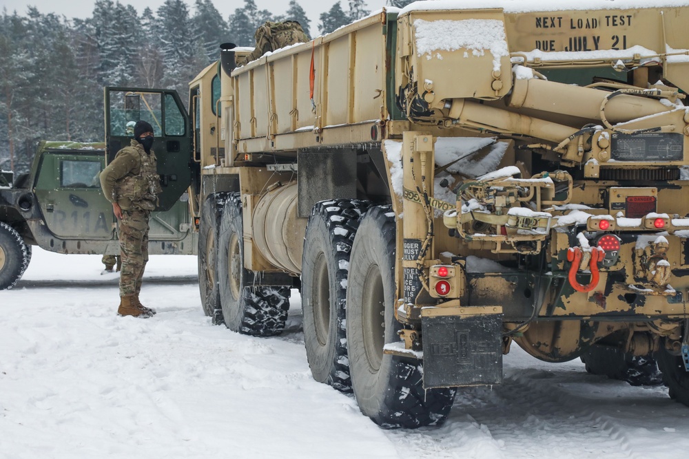 Prepares to offload equipment