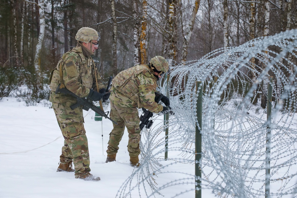 Cutting through concertina wire