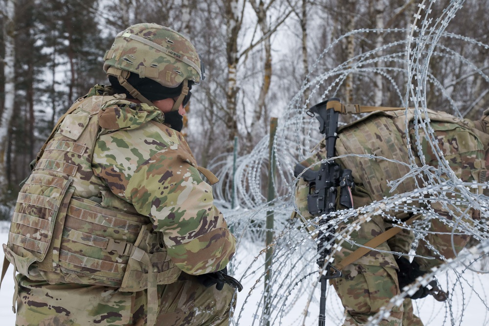 Making way through concertina wire