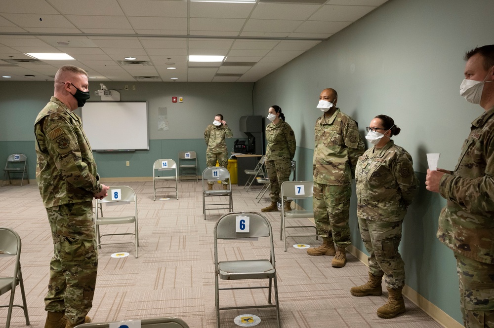 Eighteenth Air Force command chief witnesses Team Dover COVID-19 precautions, vaccine process