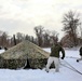 Fort McCoy CWOC class 21-03 students raise Artic tents during training scenario