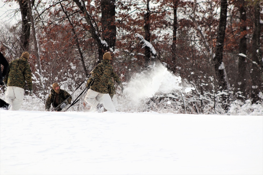 Fort McCoy CWOC class 21-03 students raise Artic tents during training scenario