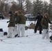 Fort McCoy CWOC class 21-03 students raise Artic tents during training scenario