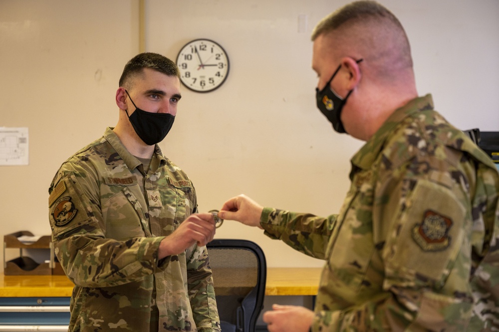 18th Air Force chief coins Team Dover star performers