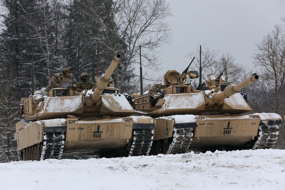 Abrams Tanks await movement