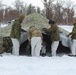 Fort McCoy CWOC class 21-03 students raise Artic tents during training scenario