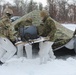 Fort McCoy CWOC class 21-03 students raise Artic tents during training scenario