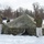 Fort McCoy CWOC class 21-03 students raise Artic tents during training scenario
