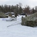 Fort McCoy CWOC class 21-03 students raise Artic tents during training scenario