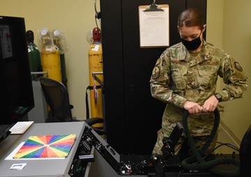 Airman prepares Reduced Oxygen Breathing Device