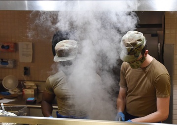 Airmen prepare Mongolian barbecue