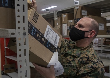 New technology at Marine Post Offices on Okinawa assures faster services, shorter wait times