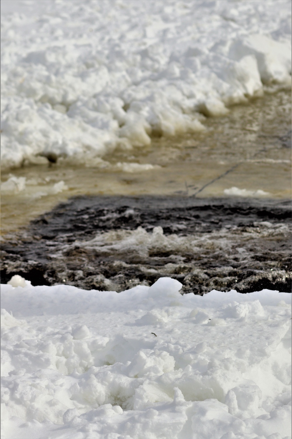 Fort McCoy CWOC class 21-03 students jump in for cold-water immersion training