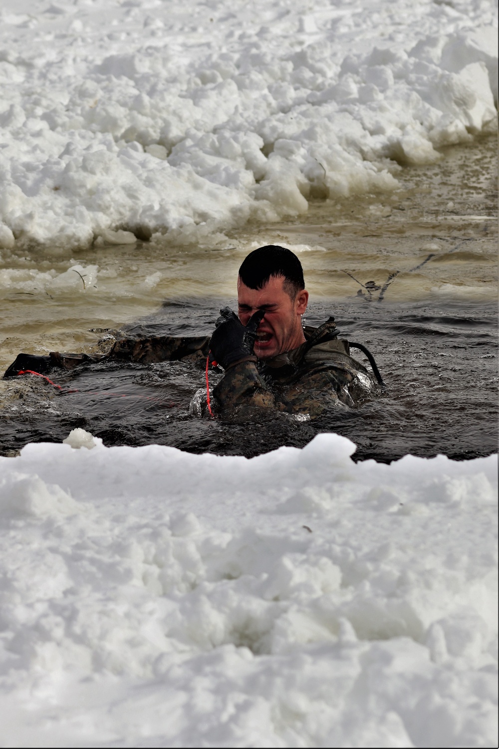 Fort McCoy CWOC class 21-03 students jump in for cold-water immersion training