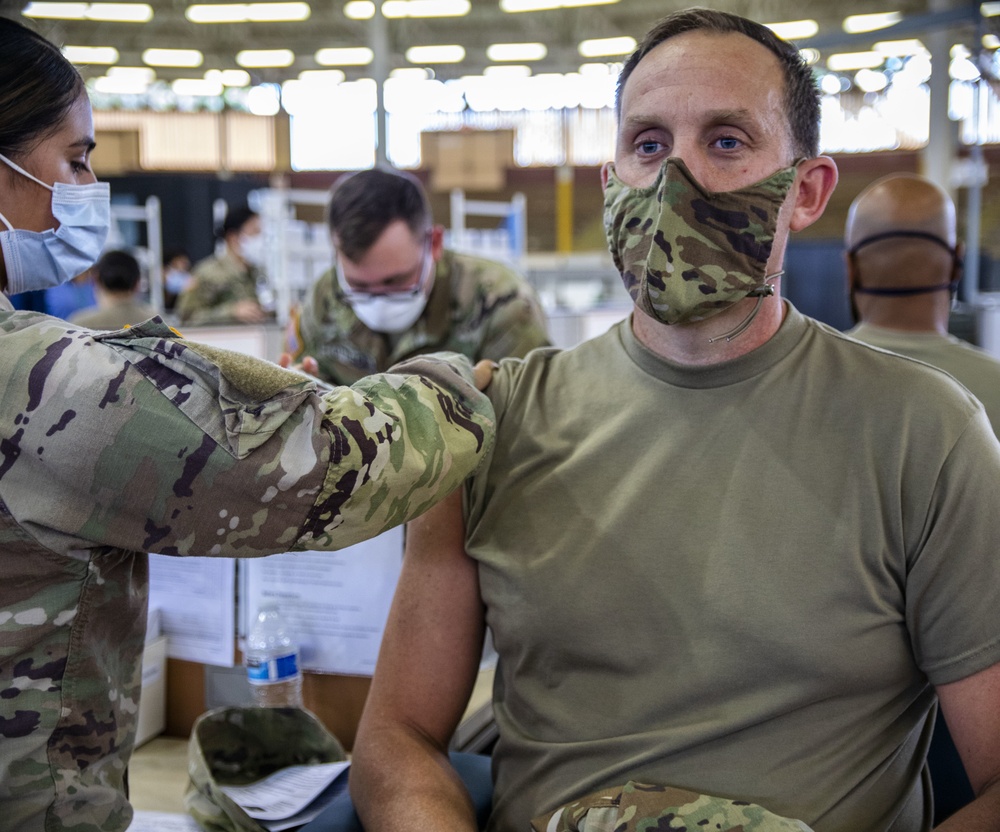 402nd AFSB receives vaccinations while continuing to mitigate COVID-19
