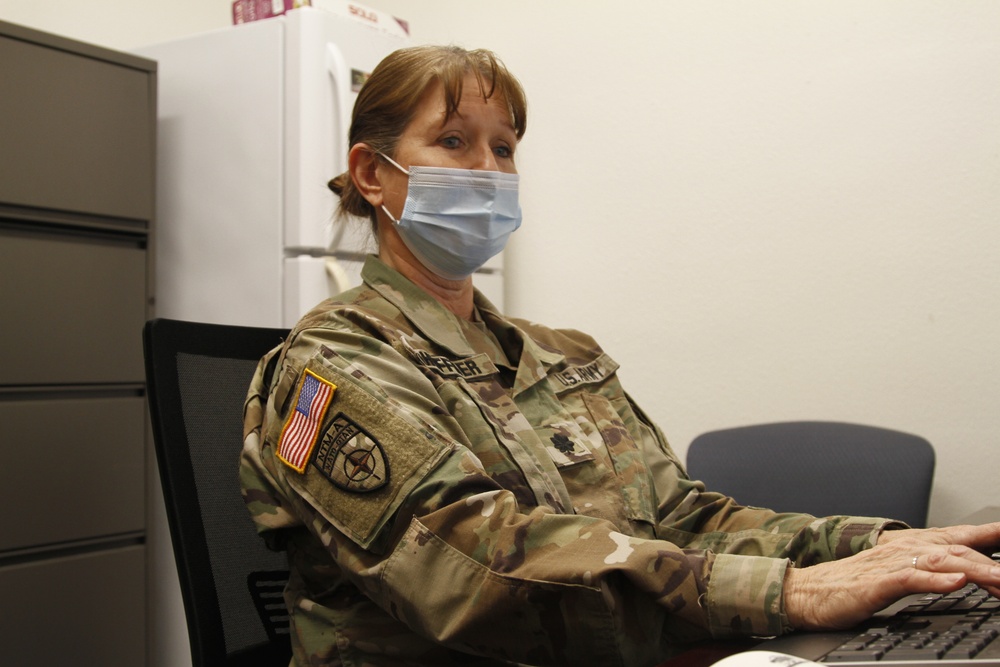 U.S. Army Arizona National Guard Ltc. Joann Shoffner validates and schedules AZ-ESAR-VHP program volunteers for training.