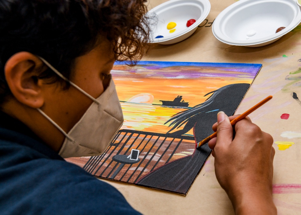 USS Carl Vinson (CVN 70) Sailors Paint Canvases For MWR Competition