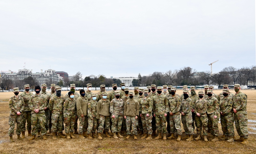 Massachusetts Army and Air National Guard members pose for photo