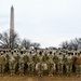 Massachusetts Army and Air National Guard members pose for photo