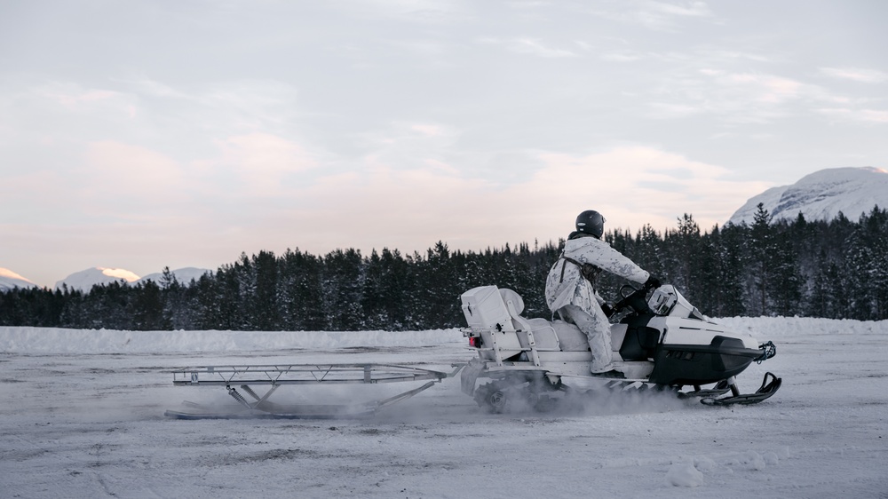 We Ride at Nightfall: MRF-E Marines Conduct Snowmobile Training