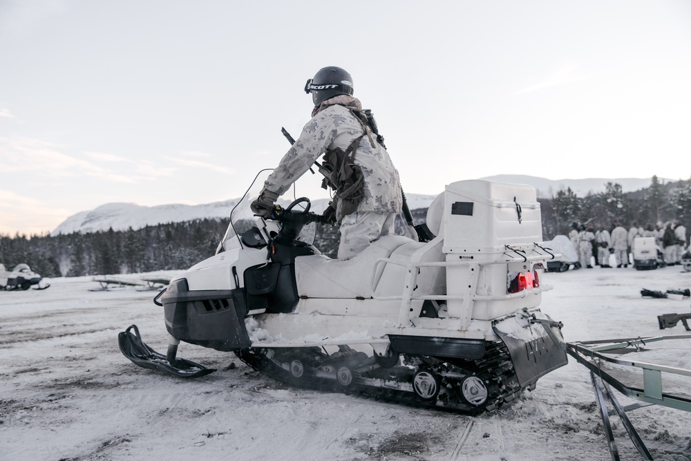 We Ride at Nightfall: MRF-E Marines Conduct Snowmobile Training
