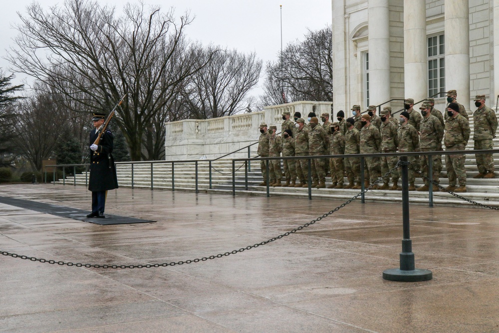 U.S. Army Soldiers with the 172nd Cavalry Regiment, 86th Infantry Brigade Combat Team (Mountain) Vermont Army National Guard, pay their respects at the Arlington National Cemetery in Arlington Virginia, February 16, 2021. The Soldiers are in Washington D.