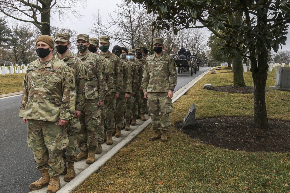 U.S. Army Soldiers with the 172nd Cavalry Regiment, 86th Infantry Brigade Combat Team (Mountain) Vermont Army National Guard, pay their respects at the Arlington National Cemetery in Arlington Virginia, February 16, 2021. The Soldiers are in Washington D.