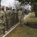 U.S. Army Soldiers with the 172nd Cavalry Regiment, 86th Infantry Brigade Combat Team (Mountain) Vermont Army National Guard, pay their respects at the Arlington National Cemetery in Arlington Virginia, February 16, 2021. The Soldiers are in Washington D.