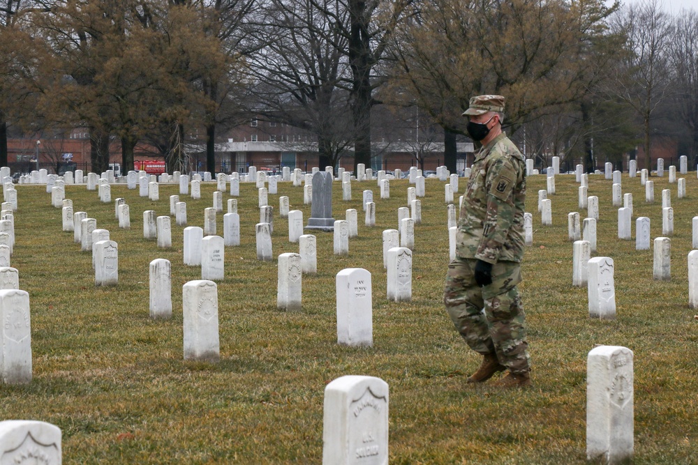 U.S. Army Soldiers with the 172nd Cavalry Regiment, 86th Infantry Brigade Combat Team (Mountain) Vermont Army National Guard, pay their respects at the Arlington National Cemetery in Arlington Virginia, February 16, 2021. The Soldiers are in Washington D.