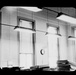Lantern Slide 46: Inside what was the 8 ½-inch transit house of the old observatory, June 1964.