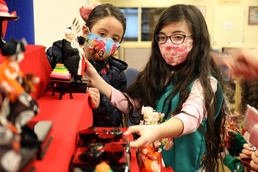 Camp Zama Girl Scouts set up doll display for Girls’ Day in Japan