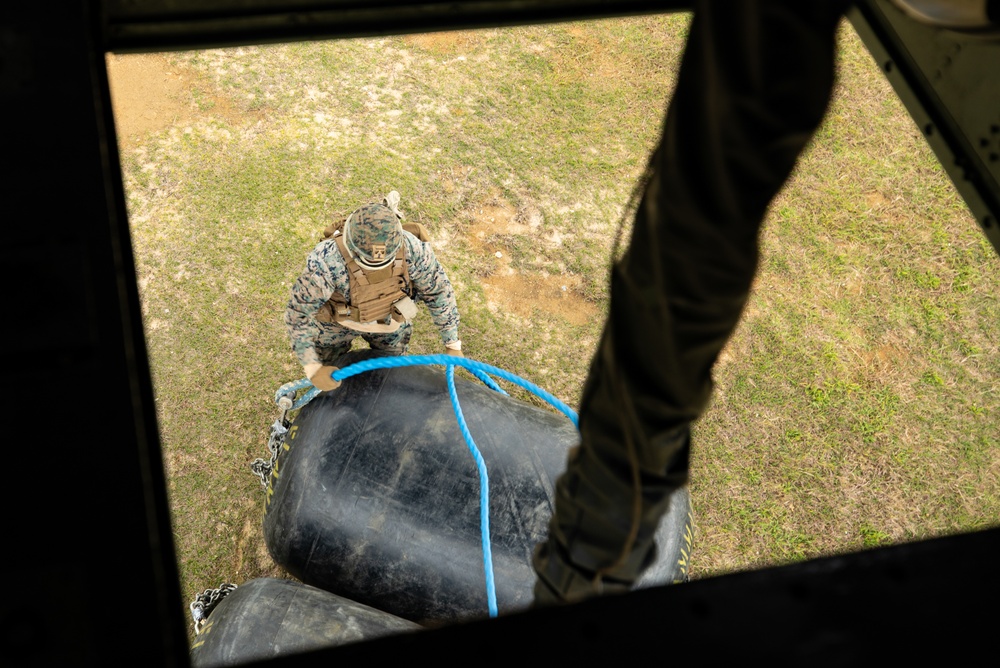 Hagåtña Fury 21: 3d Landing Support Battalion, Marine Heavy Helicopter Squadron 465 Marines team up to transport fuel