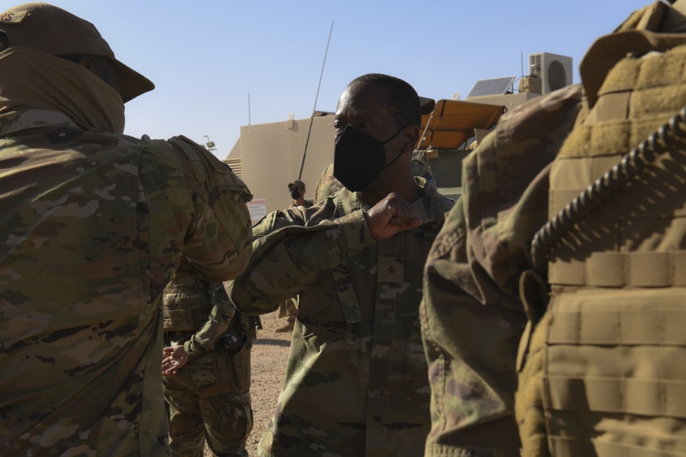 Brig. Gen. Collins, Brig. Gen. Jolly talk force protection with 409 ESFS