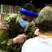 Michigan National Guard Soldier vaccinates family in childhood church
