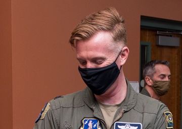 Lt. Col. Justin Galli receives parting gift at the 232nd Operations Squadron change of command