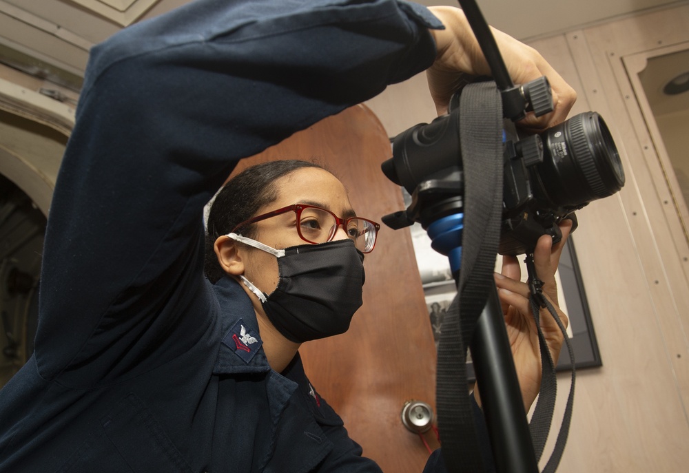 Nimitz Sailor Takes Cruisebook Photos