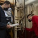 Sailors Inspect Weapons Elevator