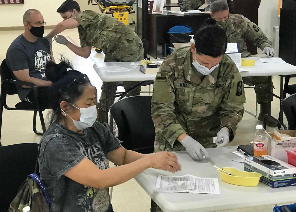 Civilian, military medical personnel deployed to Kuwait get second COVID-19 vaccinations