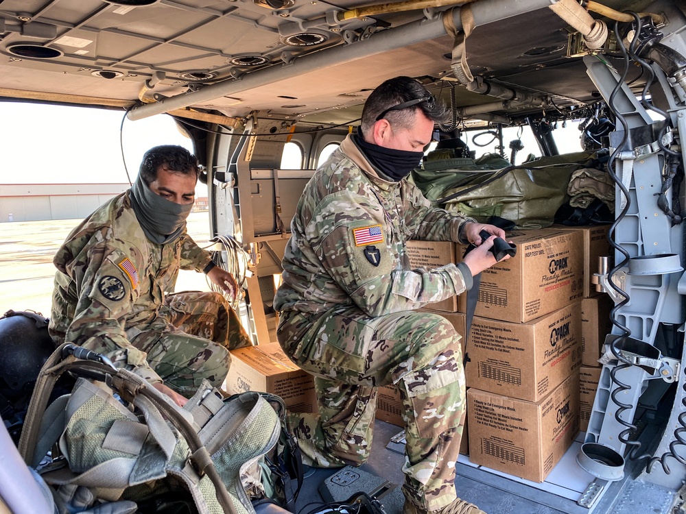 2-149 GSAB Soldiers prepare to transport food to Texans
