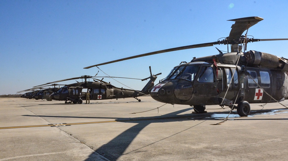 UH-60 aircraft are prepped to transport supplies to Texans
